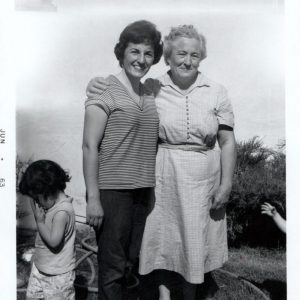 Gloria with mom, 'Concha' and baby Jane in the Urriola family yard  in Battle Mountain  1963
